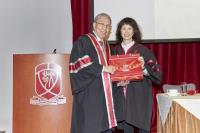 Prof Wai-Yee CHAN (left), College Master, presenting Prof PANG (right) with souvenirs